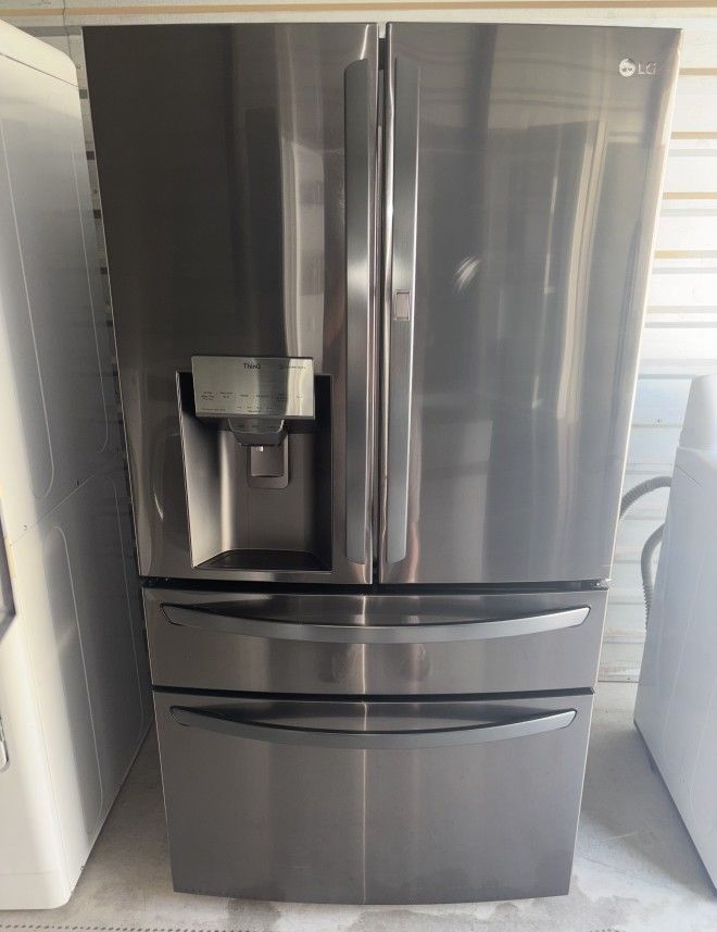 LG Dark Stainless Steel Refrigerator And Freezer
