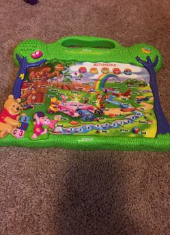 Disneys press n play learning board