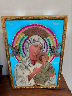 Lighted devotional icon of Our Lady of Perpetual Help