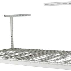 LOW PRICE MOVING- LARGE NEW IN BOX GARAGE MOUNTED ORGANIZER 