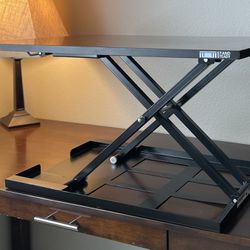 Adjustable Standing Desk. Retails For $300.