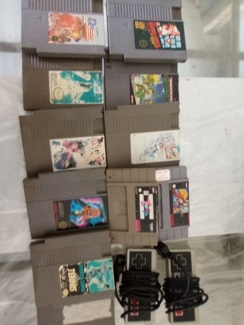 Nintendo NES games and two controllers take all of them 4 $40; I will trade for a Nintendo switch game message me tell me what game you have