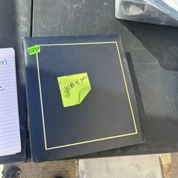 Estate sale item limited info Repurpose photo album used has pics