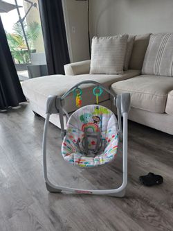 Battery operated baby swing