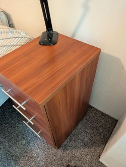 Wooden night table with 3 drawers