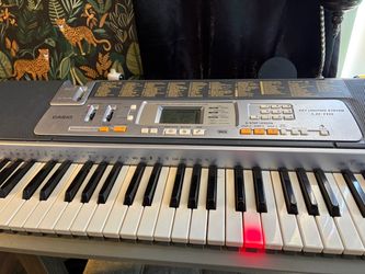Casio LK-110 Keyboard with 100 Song Bank
