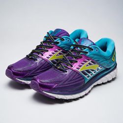 Brooks Glycerin 14 women's running shoes. This specific colorway features a vibrant combination of purple, teal, and blue with metallic overlays.