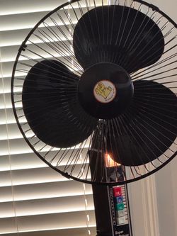 Vintage Supet Deluxe Oscillating fan with light . Adjustable $70 obo