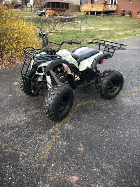 Youth ATV. 110cc. Runs great. Moving and must sell.