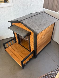 Large wooden dog house