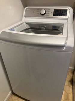LG washer.    White   Top loading