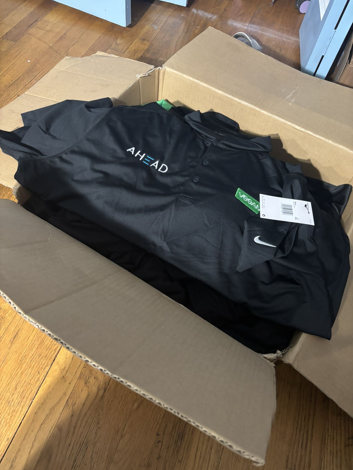 Box full of miscellaneous sizes company golf Nike shirts with tags brand new All box for $40