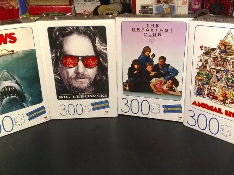4 Brand New 300 Piece Blockbuster Puzzles..Jaws, The Big Lebowski, The Breakfast Club, And Animal House