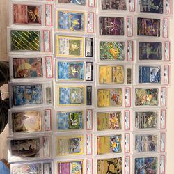 Assorted graded Pokemon cards