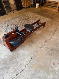 Merach Rowing Machine