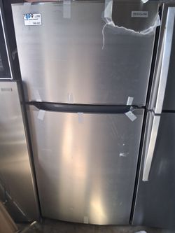 New Frigidaire top and bottom fridge stainless steel