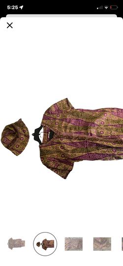 cultural Purple and gold patterned shrit and skirt set with matching headpiece.