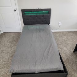 Twin sized bed with 4 drawers with charging ports (mattress not included)