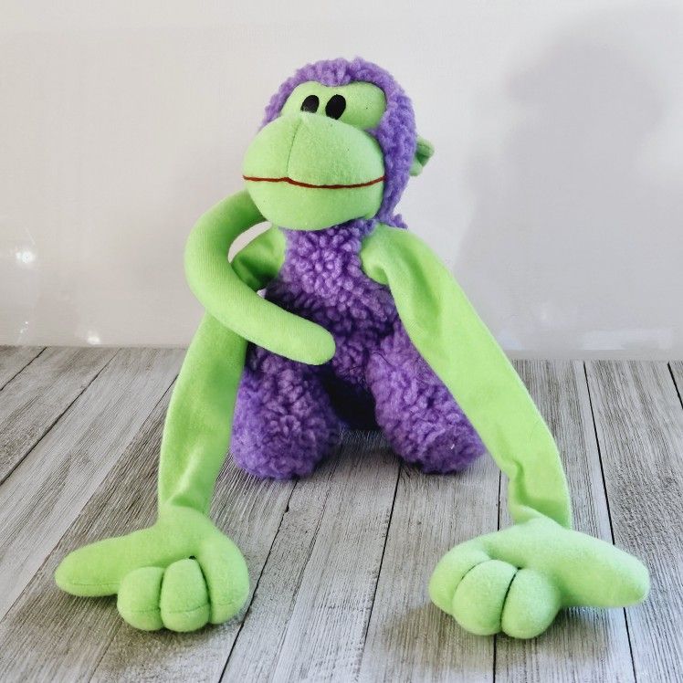 8" Giant Hands Purple Neon Green Monkey Chimpanzee Plushie Stuffed Animal with Long Floppy Arms and Curled Tail. Circa Y2K. Pre-owned in excellent con