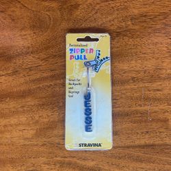 Unopened Stravina Zipper Pull