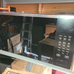 Brand new whirlpool microwave