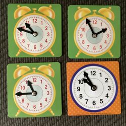 Four Cardboard Classroom Clocks