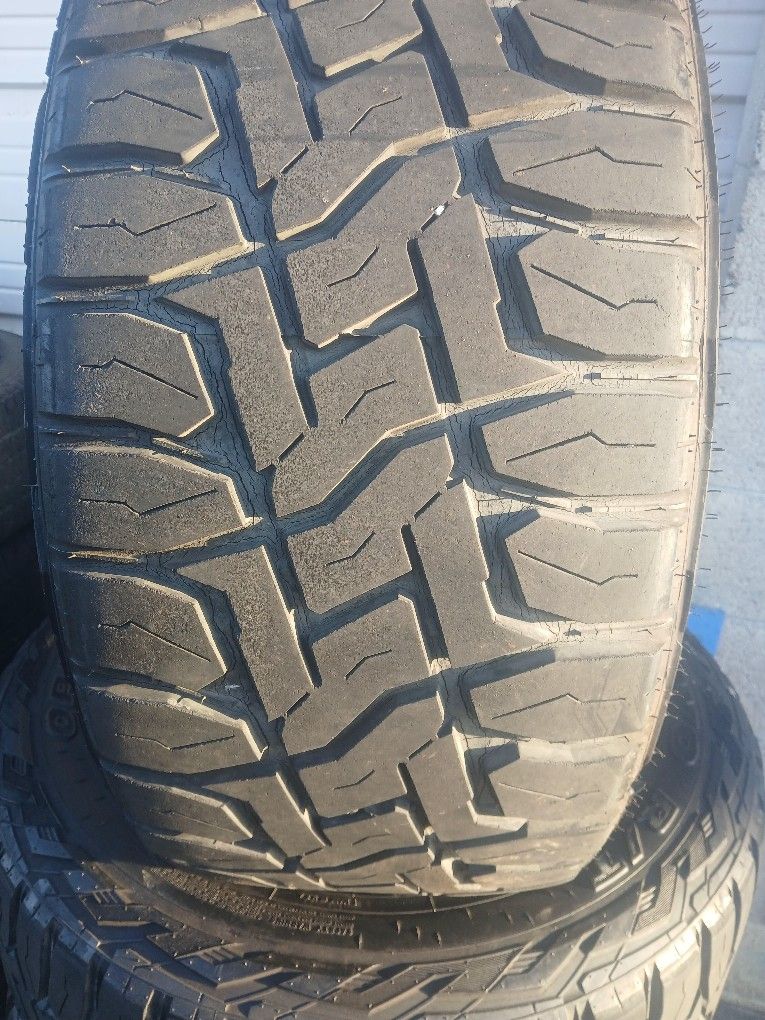 33x12.50R20 Toyo RT Tires 70% Tread (4)