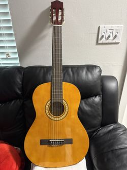 Guitarra Nueva Con Su Estuche