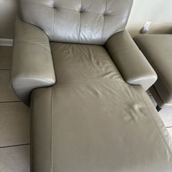 Two Leather Chaises 