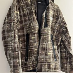 The Northface summit series jacket camo theme