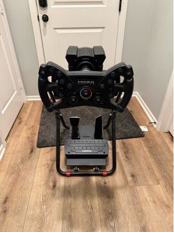 Moza R9 sim  setup with foldable stand.