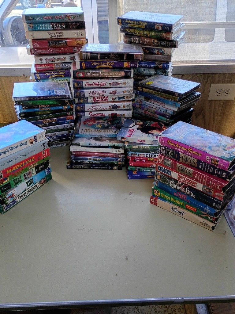 DVDs And VHS Some Brand New. Movies