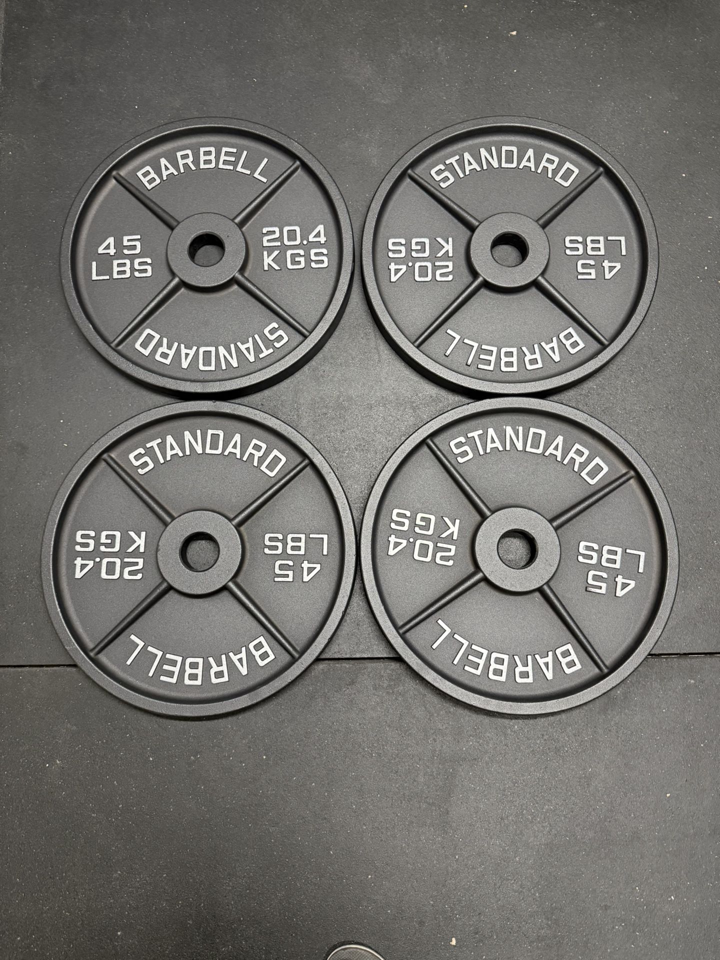 4 - 45 Pound Olympic Weight Plates
