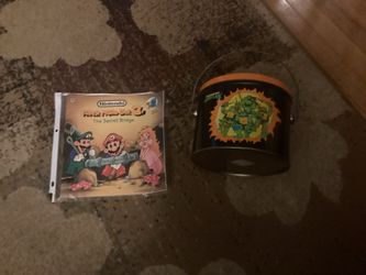 Book and tin