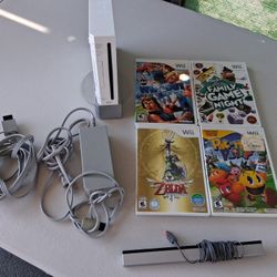 Wii And 4 Games  /no Control 