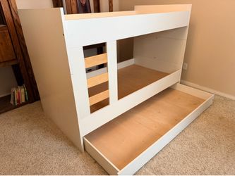 White wood twin over twin bunk bed with trundle/ storage
