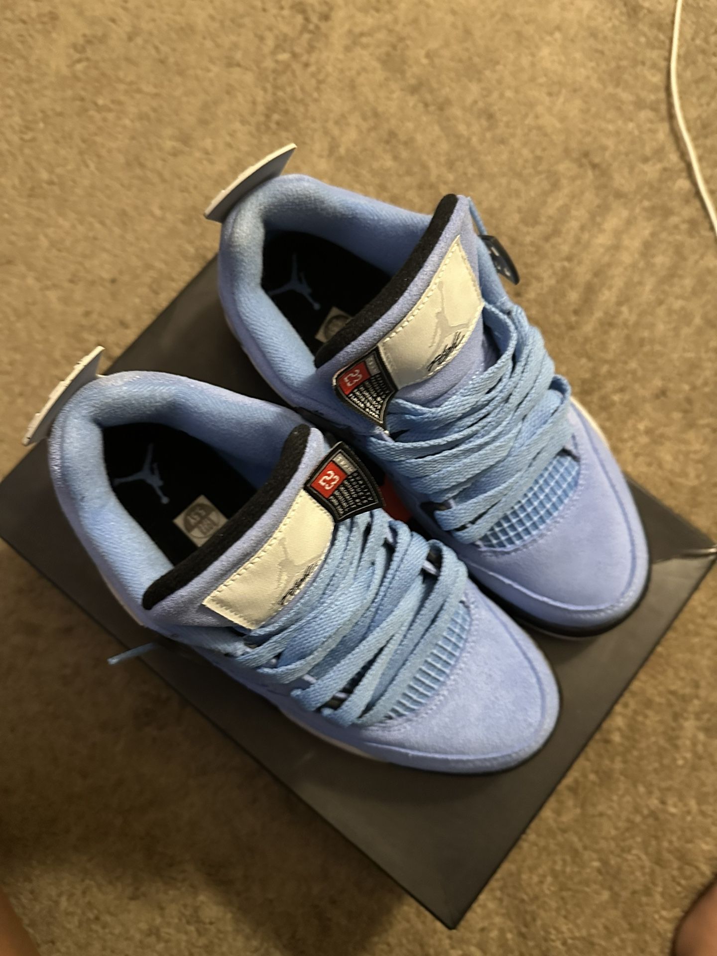 Jordan 4 university blues