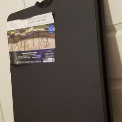 BRAND NEW 4FT FOLDING TABLE....NEVER USED