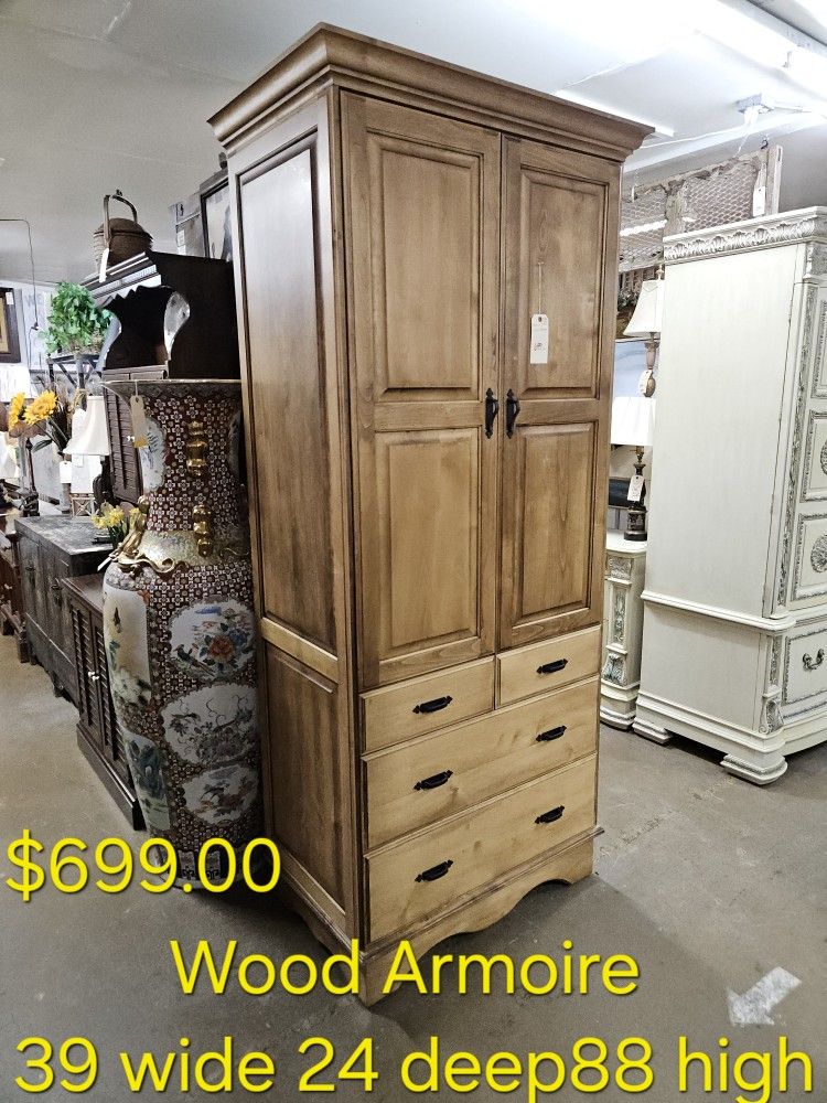 Armoire Cabinet We are located at 2811 East Bell road. Another Time Around Furniture.