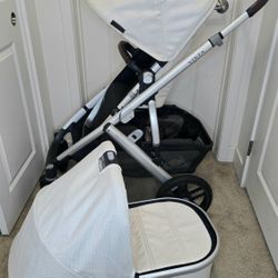 White Uppababy VISTA V2 stroller Toddlerseat Bassinet 