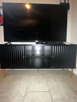 Modern Black TV Stand with Fluted Doors & Gold Legs (54")