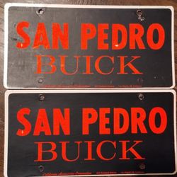 Vintage San Pedro Buick dealer license plate inserts, black/neon orange
