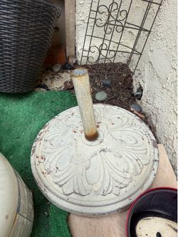 vintage-style white metal display stand or base with a distressed finish