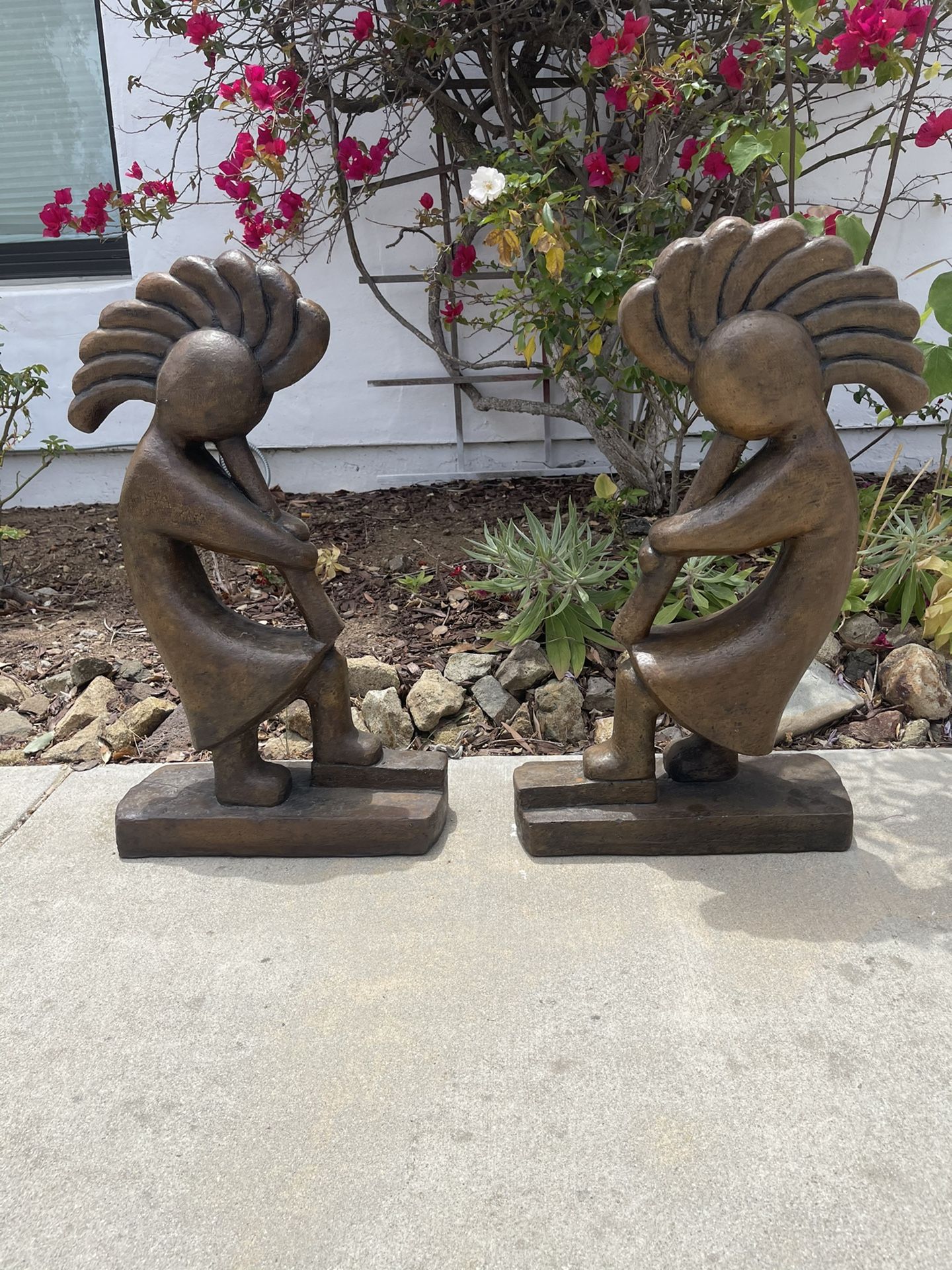 Concrete Kokopelli Statue