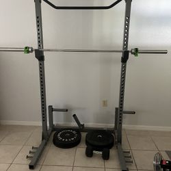 Squat Rack 45lb Bar And Weights $500