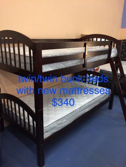 New twin bunkbeds with mattresses $340