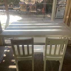 little kids arts and crafts table, including two chairs
