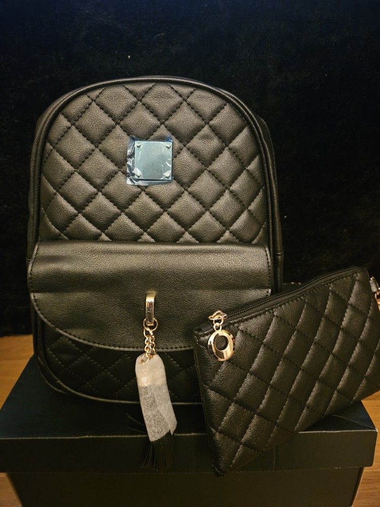 Brand new black faux leather backpack And Matching Wallet Set
