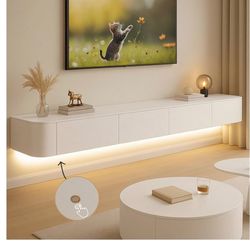 Brand New, Unused Modern TV Stand with LED Lights.” 