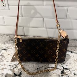 LV Pochette Accessories Handbag